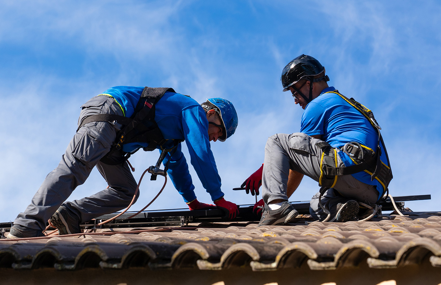 A roofing company on a job site